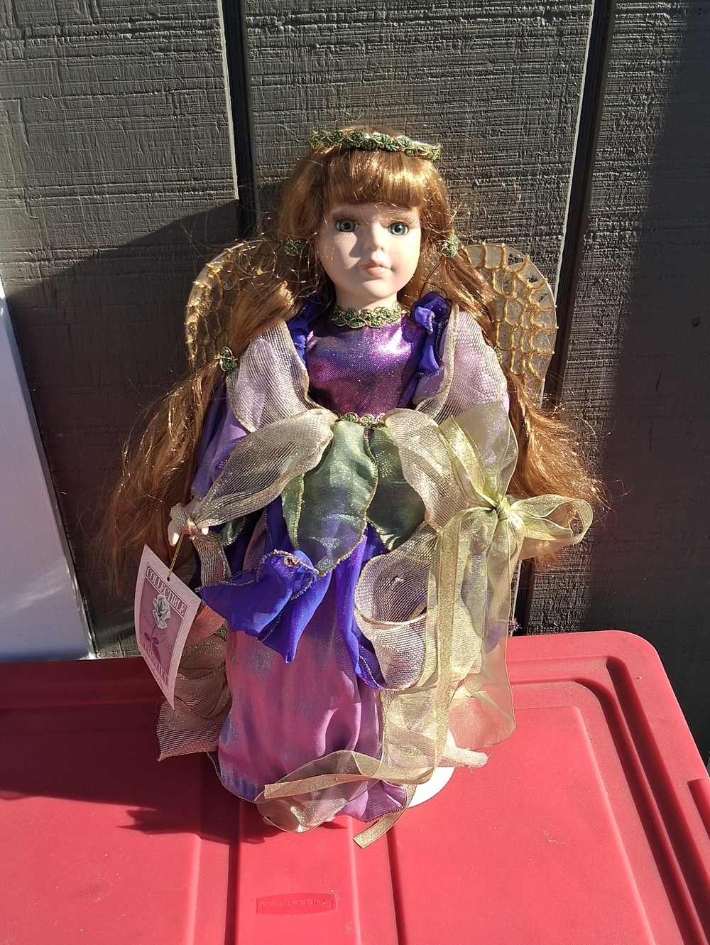 Porcelain Fairy Doll with Gold Wings and Multi-Colored Dress